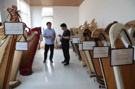 国庆彩车上弹箜篌的是河南姑娘!箜篌文化创意产业在河南落地生根